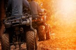 man riding atv vehicle on off road track people outdoor sport activitiies theme banner iStock 818157080